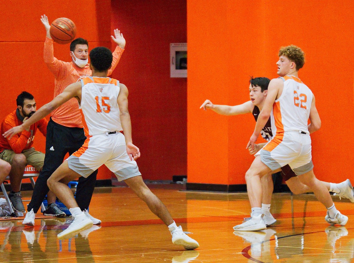 Jaxon Holland (15) and Dawson Pendergrass (22) of Mineola disrupt a Whitehouse pass in a non-district contest last Tuesday. [print this shot, view others]